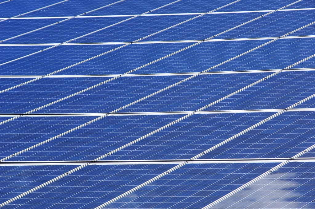 Close-up view of solar panels outdoors capturing renewable energy efficiently.bbn transport